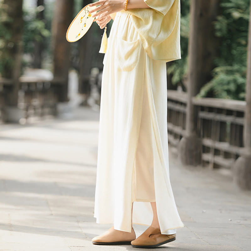 Spódnica damska z kieszeniami i rozcięciem u dołu w jednolitym kolorze z Buddha Stones - image 2