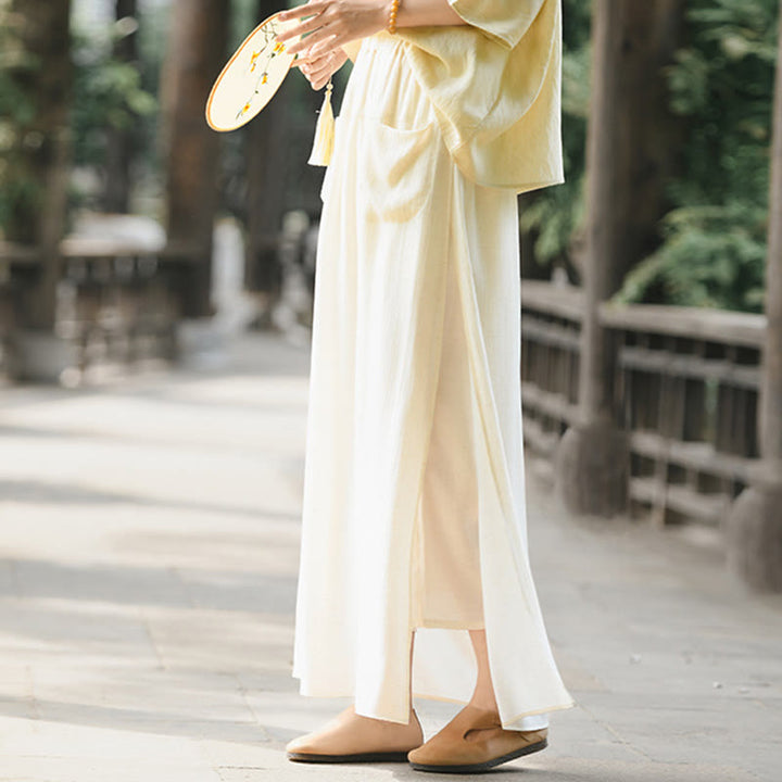 Spódnica damska z kieszeniami i rozcięciem u dołu w jednolitym kolorze z Buddha Stones - image 2