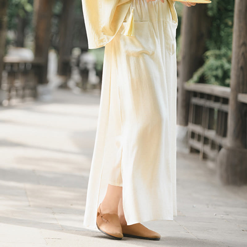 Spódnica damska z kieszeniami i rozcięciem u dołu w jednolitym kolorze z Buddha Stones - image 4