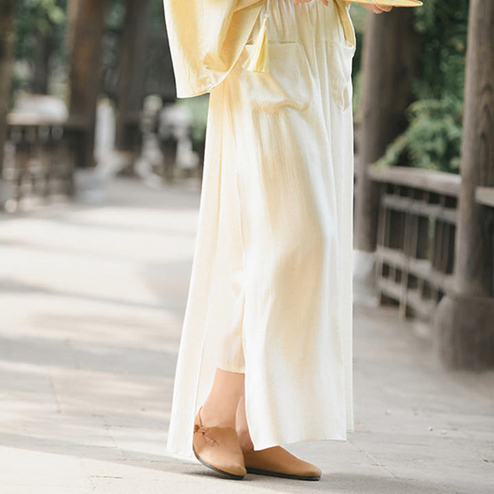 Spódnica damska z kieszeniami i rozcięciem u dołu w jednolitym kolorze z Buddha Stones - image 4