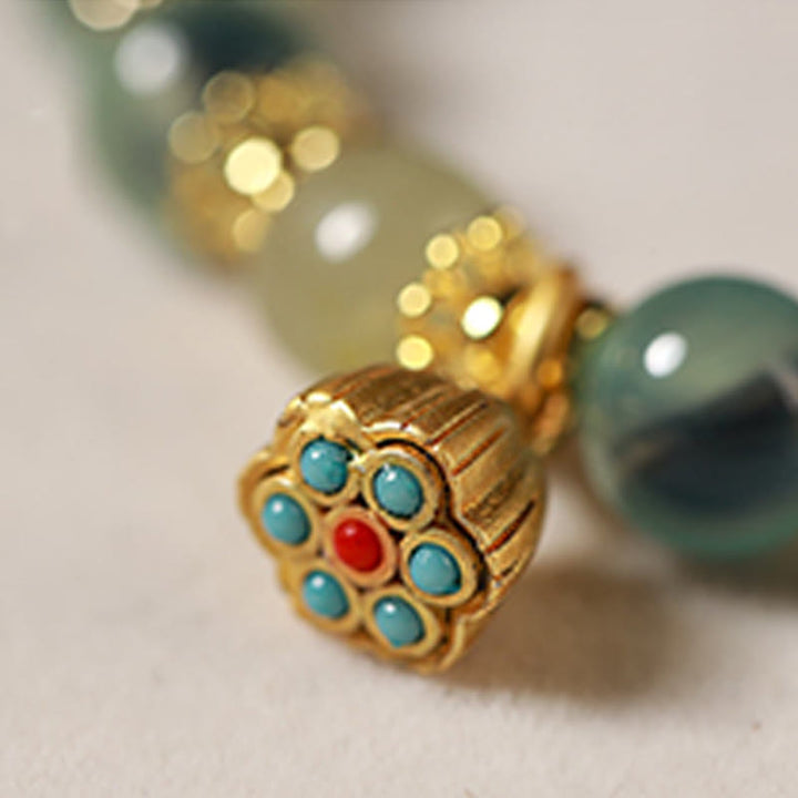 Bransoletka Buddha Stones z naturalnego, kolorowego, cukierkowego agatu i złotego strąka lotosu - image 8