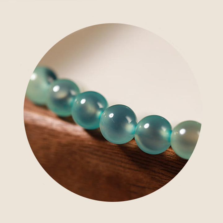 Bransoletka Buddha Stones z naturalnego, kolorowego, cukierkowego agatu i złotego strąka lotosu - image 4