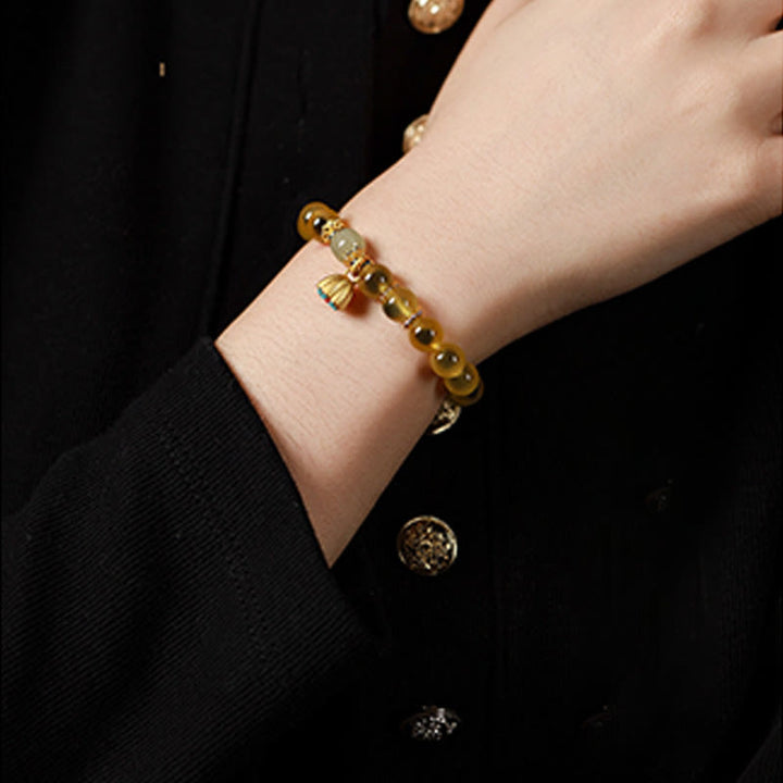 Bransoletka Buddha Stones z naturalnego, kolorowego, cukierkowego agatu i złotego strąka lotosu - image 11