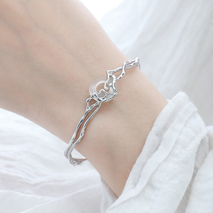 Bransoletka ochronna z białego agatu z Buddha Stones ze srebra próby 925 i klamrą pokoju - image 2