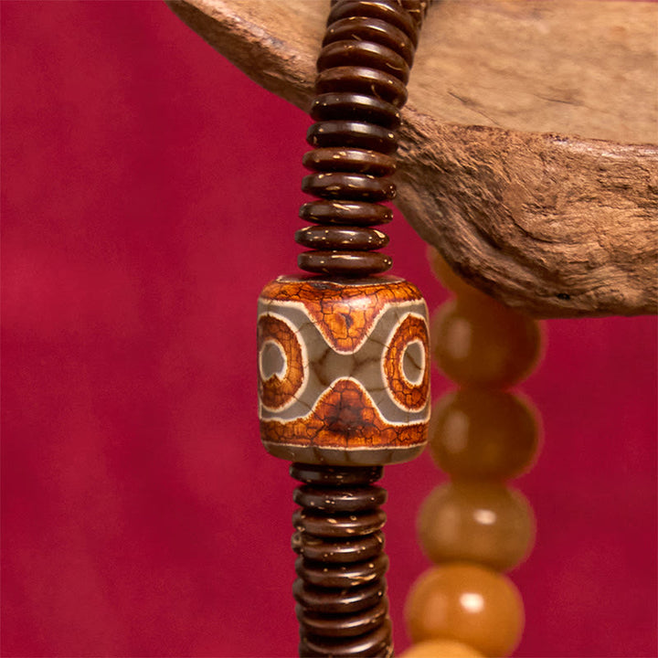 Bransoletka mądrości z tybetańskich Buddha Stones z nasionami bodhi i koralikami Dzi z łupin kokosa