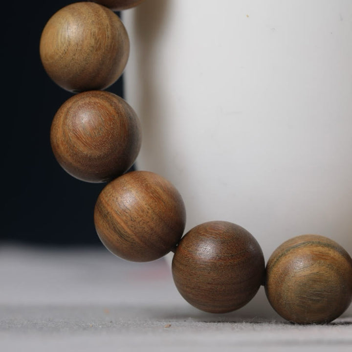 Bransoletka PiXiu z zielonymi Buddha Stones i sandałowcem, która przyciąga bogactwo - image 11