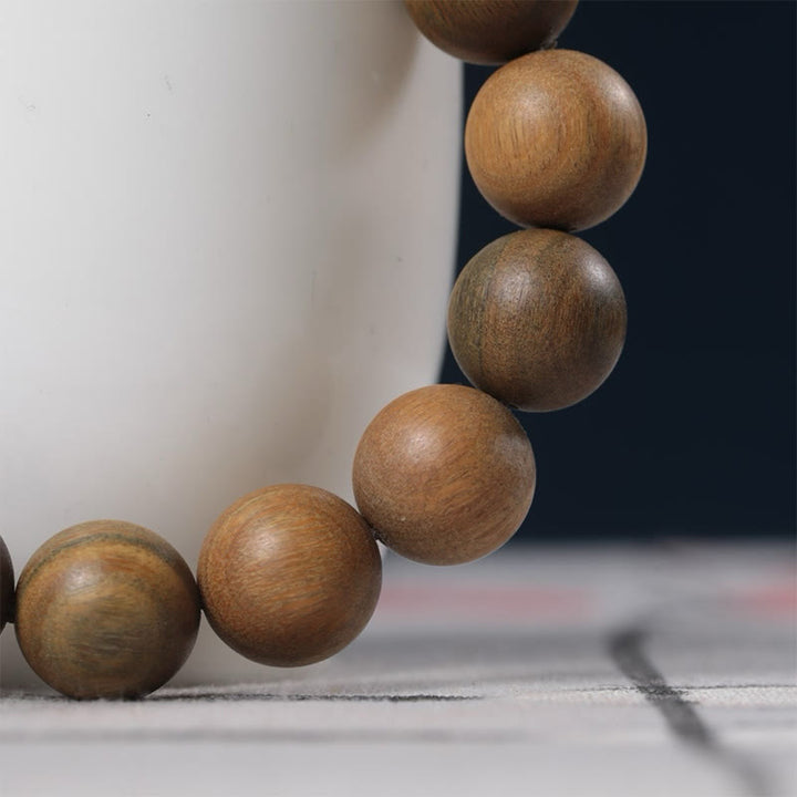 Bransoletka PiXiu z zielonymi Buddha Stones i sandałowcem, która przyciąga bogactwo - image 12