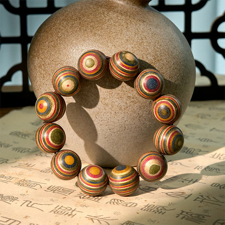 Bransoletka równowagi z kolorowych tęczowych Buddha Stones i eukaliptusa - image 3