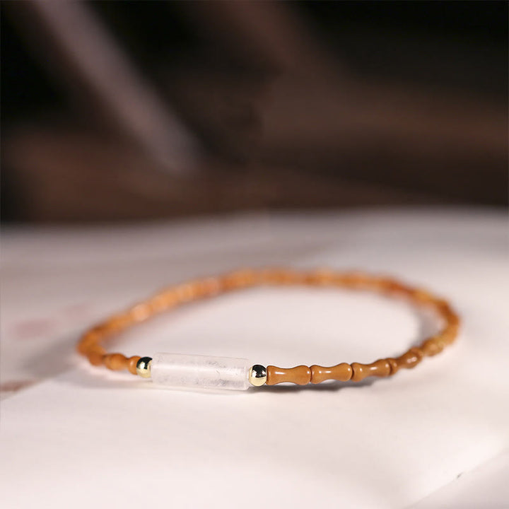 Bransoletka Peace z Buddha Stones z pestek oliwek o ultracienkiej fakturze - Pestka oliwki i biały kryształ (obwód nadgarstka: 14-16 cm) - image 19