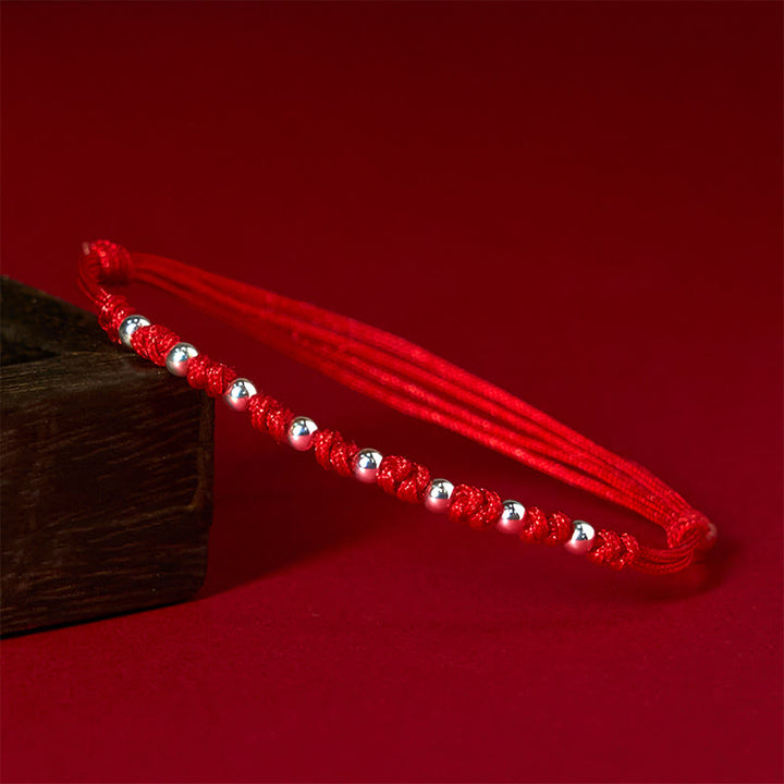 Bransoletka szczęścia z regulowanymi koralikami z Buddha Stones ze srebra próby 925 i czerwonego sznurka - Srebro próby 925 (obwód nadgarstka: 15-23 cm) - image 1