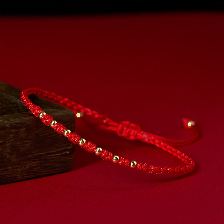 Bransoletka ochronna z plecionych Buddha Stones ze srebra próby 925, pozłacanych koralików i czerwonego sznurka - image 4