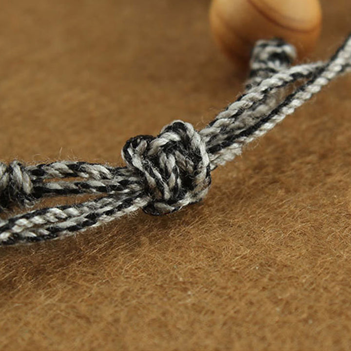 Bransoletka ochronna z liną Zakiram z turkusowym okiem Buddy i lotosem w kształcie Buddha Stones - image 14