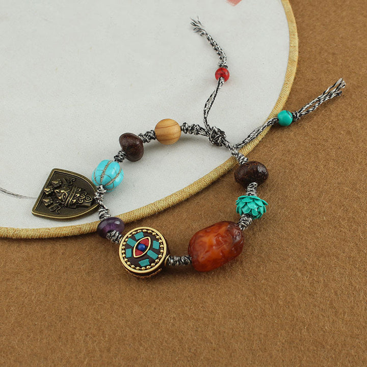 Bransoletka ochronna z liną Zakiram z turkusowym okiem Buddy i lotosem w kształcie Buddha Stones - image 9