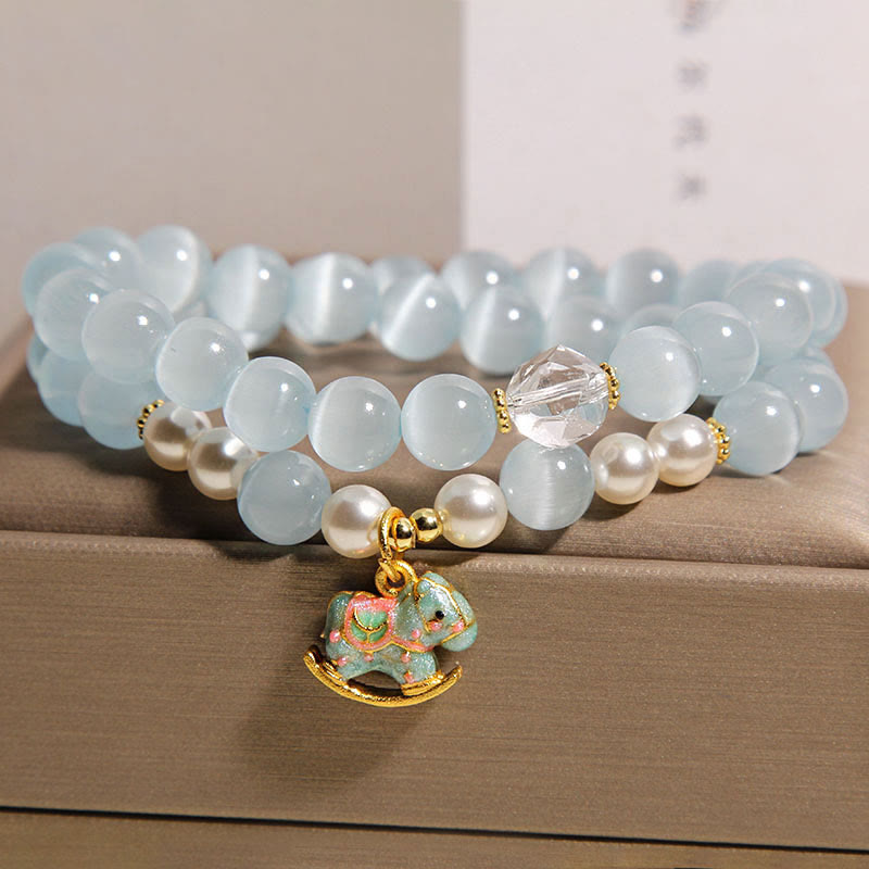 Bransoletka z podwójnym owinięciem i zawieszką w kształcie konia trojańskiego z niebieskimi kocimi oczami i Buddha Stones - image 5