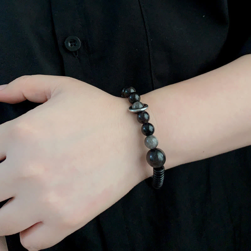 Bransoletka ochronna z obsydianu i skorupy kokosa z Buddha Stones w srebrnym połysku - image 9