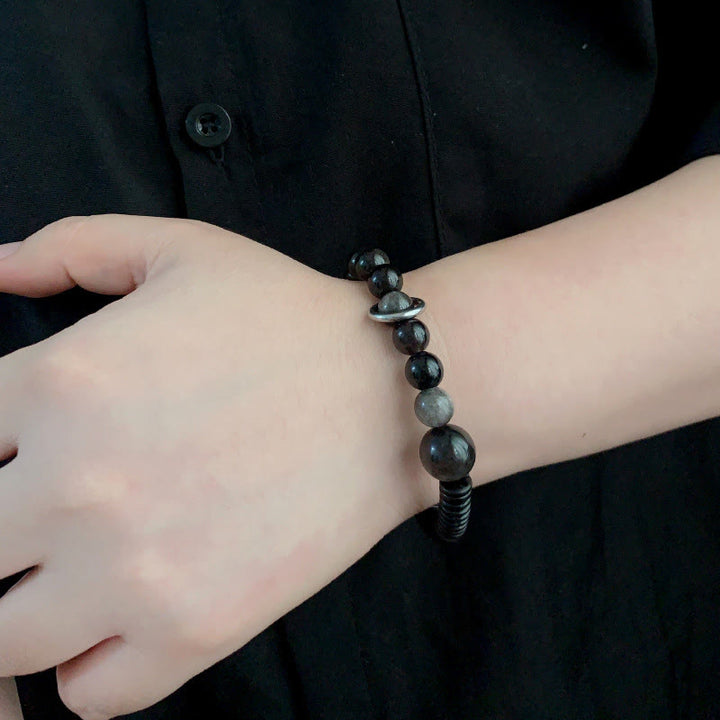 Bransoletka ochronna z obsydianu i skorupy kokosa z Buddha Stones w srebrnym połysku - image 9