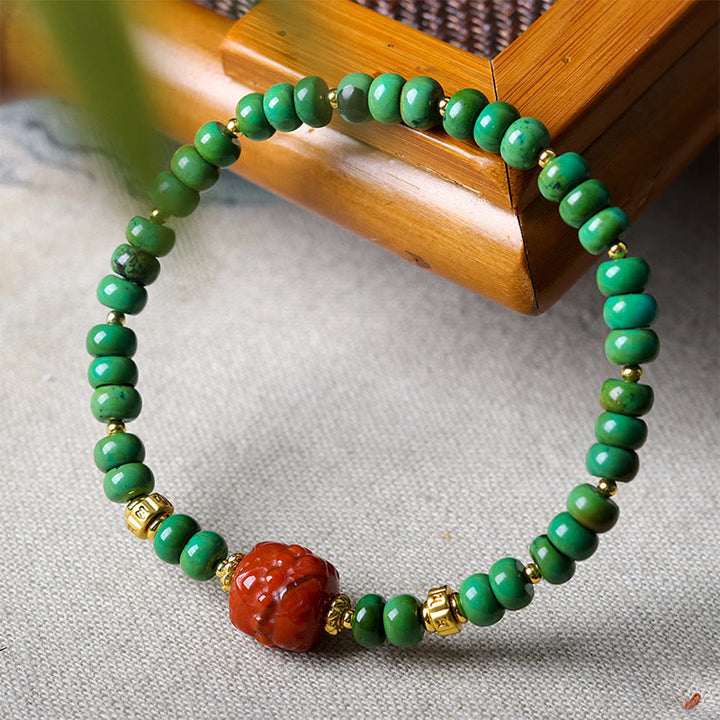 Bransoletka z koralikami z turkusu tybetańskiego i południowo-czerwonego agatu z motywem lotosu i kamieniami Buddha Stones - image 2