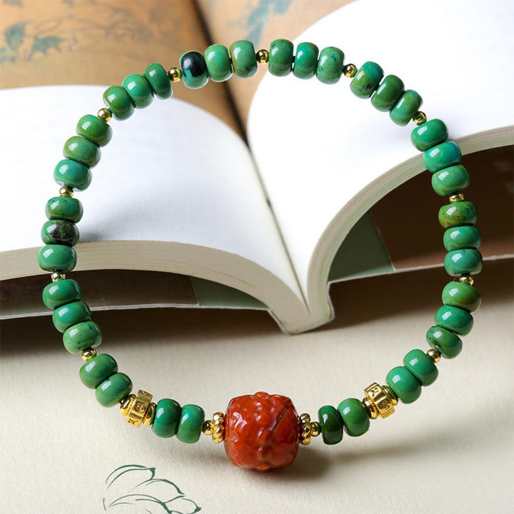 Bransoletka z koralikami z turkusu tybetańskiego i południowo-czerwonego agatu z motywem lotosu i kamieniami Buddha Stones - image 3