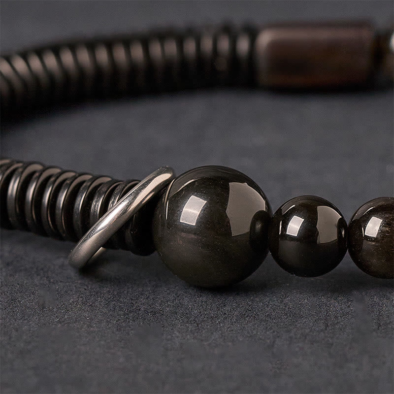 Bransoletka ochronna z obsydianu i skorupy kokosa z Buddha Stones w srebrnym połysku - image 3