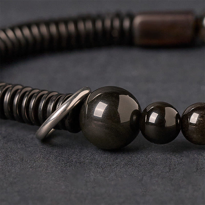 Bransoletka ochronna z obsydianu i skorupy kokosa z Buddha Stones w srebrnym połysku - image 3