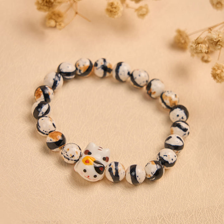 Bransoletka wzmacniająca z naturalnym kamieniem i ceramiczną głową kociaka z Buddha Stones - image 3