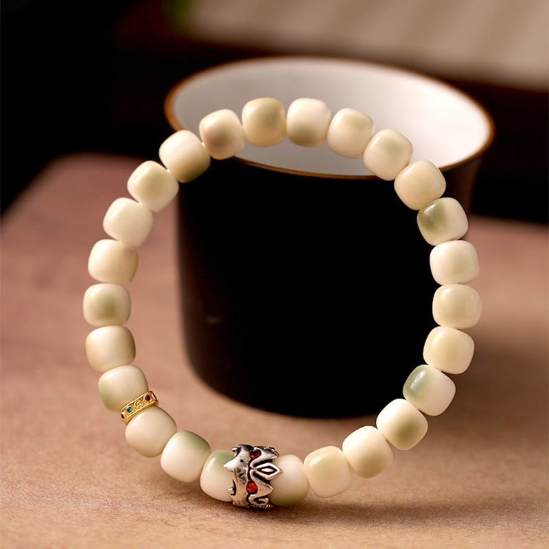 Bransoletka mądrości Garuda z Buddha Stones, nasionami Bodhi, kutą miedzią i mosiądzem - Nasiona Bodhi i Garuda (obwód nadgarstka: 15-17 cm) - image 0