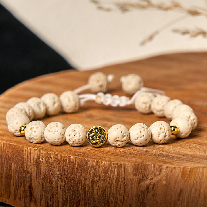 Bransoletka z Buddha Stones, białymi skałami lawowymi i symbolem Om, uzdrawiająca i uspokajająca - image 2
