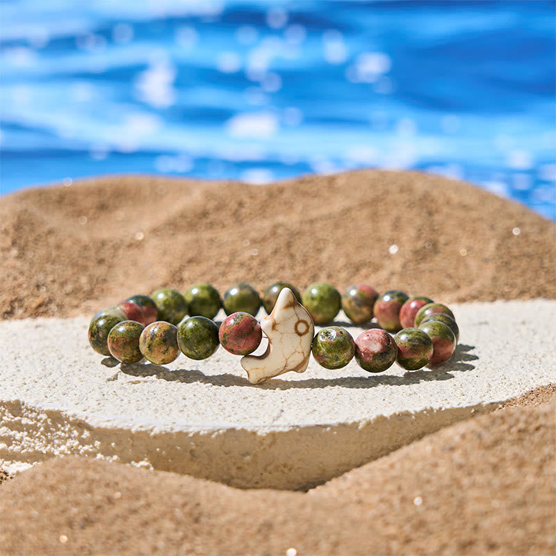 Bransoletka z Buddha Stones , naturalnymi i różnymi kamieniami, z delfinem, zapewniająca równowagę duchową - Unakit (obwód nadgarstka: 15-18 cm) - image 24