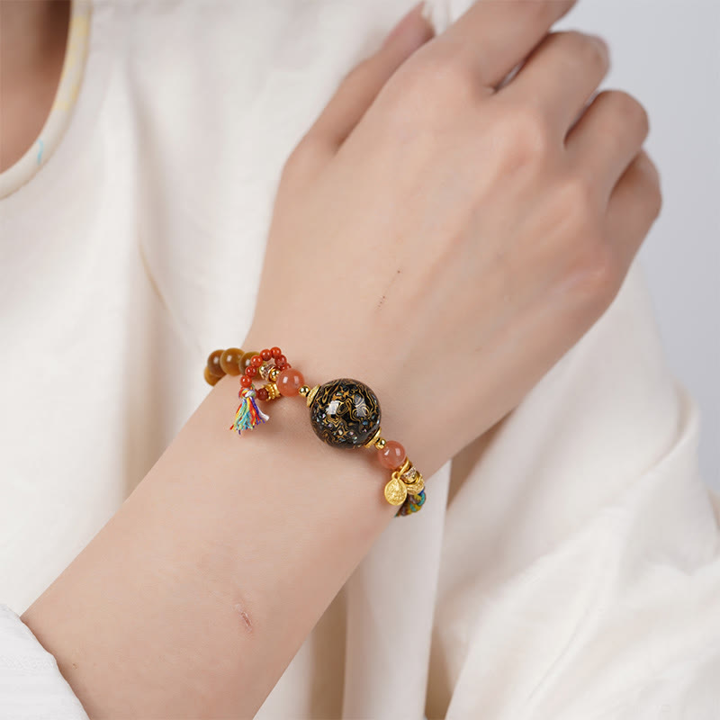 Bransoletka ochronna z kamieniami Buddha Stones z tybetańskich koralików lakierowanych, tkana ręcznie - image 4