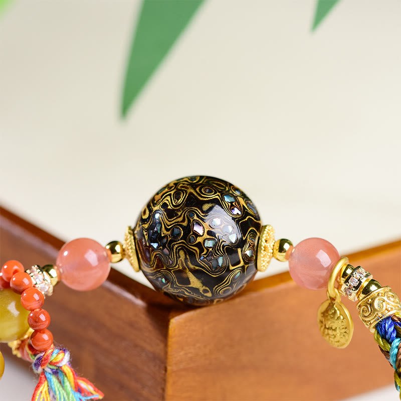 Bransoletka ochronna z kamieniami Buddha Stones z tybetańskich koralików lakierowanych, tkana ręcznie - image 10