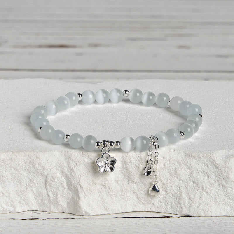 Bransoletka spokoju z naturalnych Buddha Stones z kocim okiem i kwiatem wiśni - image 2