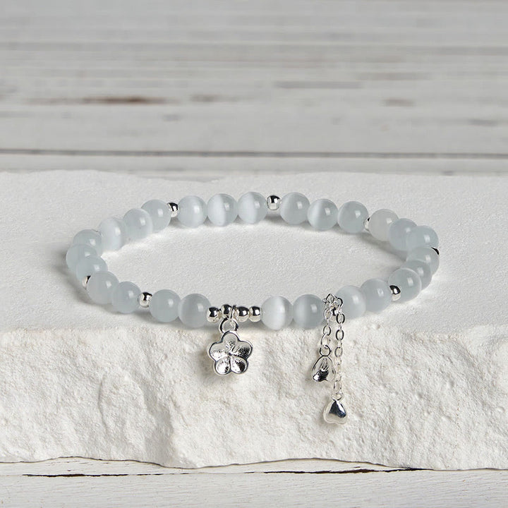 Bransoletka spokoju z naturalnych Buddha Stones z kocim okiem i kwiatem wiśni - image 2