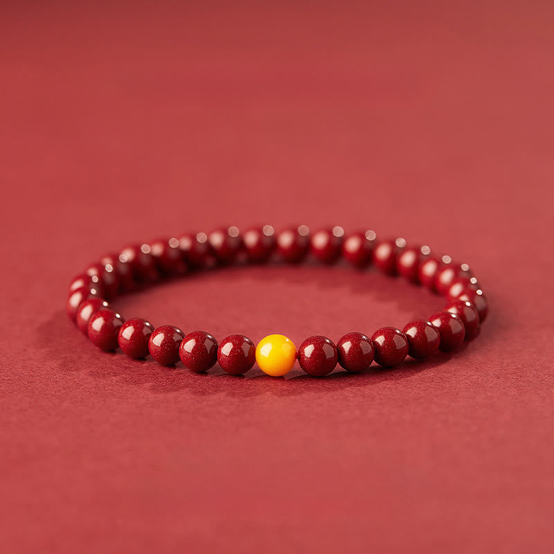 Bransoletka z Buddha Stones , naturalnym bursztynem i cynobrem - 6mm Cynober - image 0