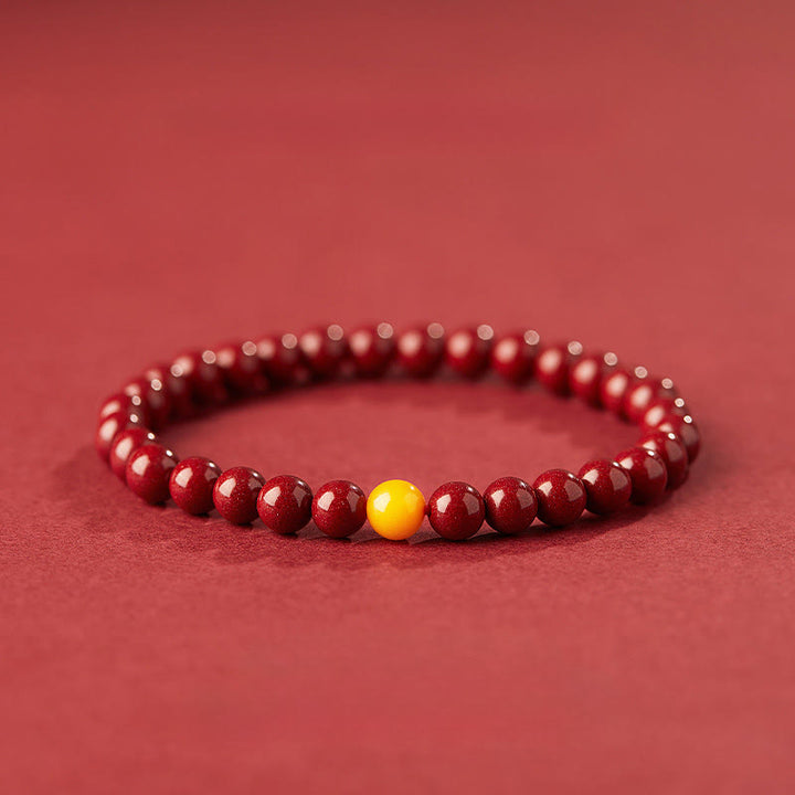 Bransoletka z Buddha Stones , naturalnym bursztynem i cynobrem - 6mm Cynober - image 0