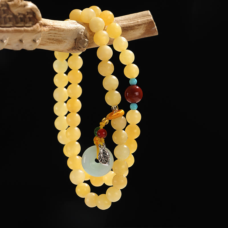Bransoletka z podwójnym zapięciem i topazem z Buddha Stones , zdobiona klamrą pokoju i wzorem bogactwa - image 6