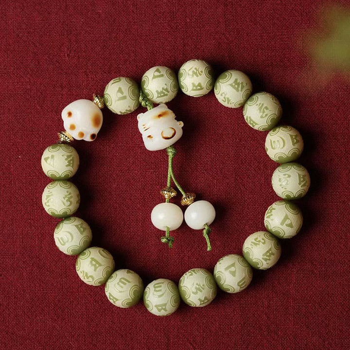 Buddha Stones Zielone Nasiona Bodhi Łapa Kota Om Mani Padme Hum Grawerowana Bransoletka Mądrości - image 3