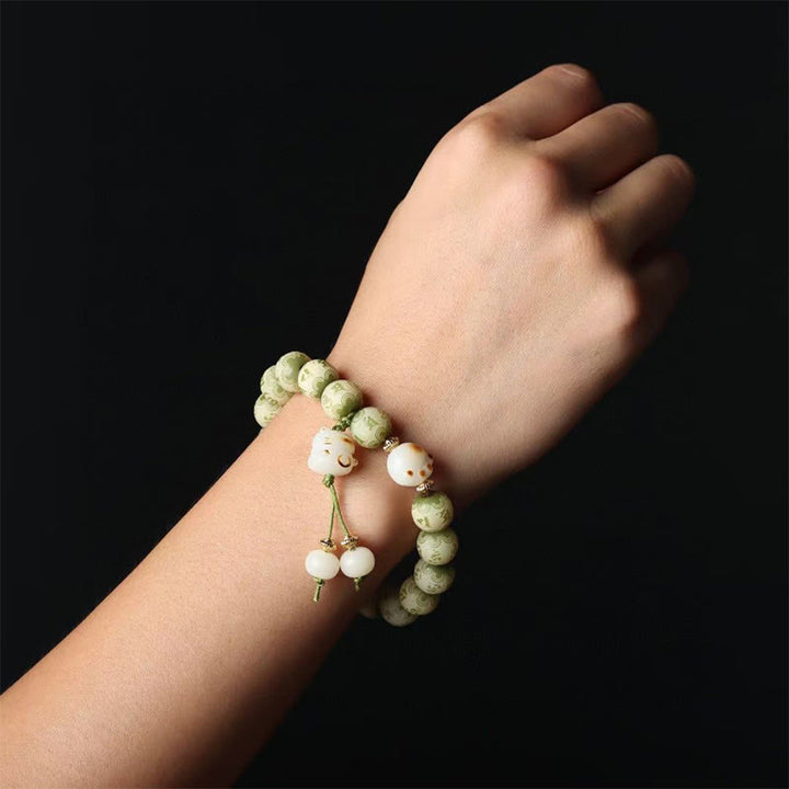 Buddha Stones Zielone Nasiona Bodhi Łapa Kota Om Mani Padme Hum Grawerowana Bransoletka Mądrości - image 6