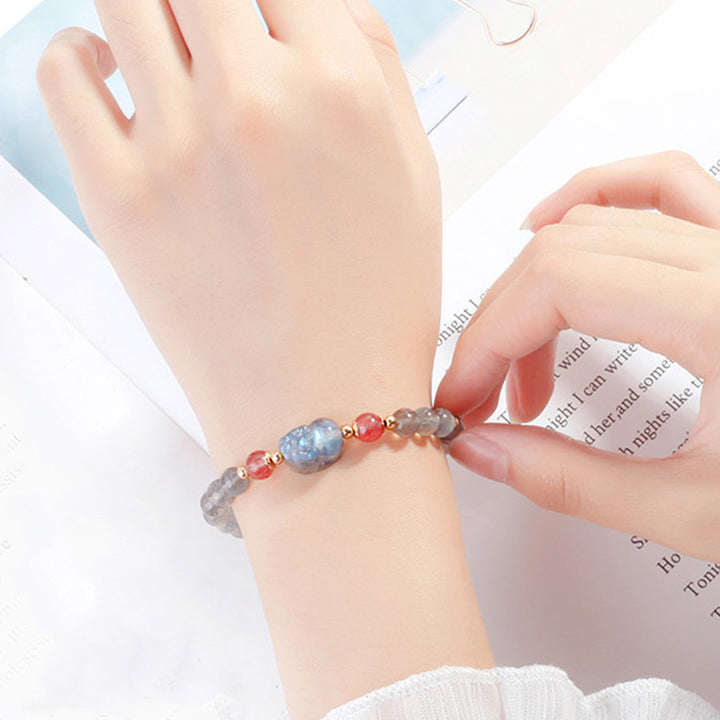 Bransoletka lecznicza PiXiu z Buddha Stones, kamieniem księżycowym i kwarcem truskawkowym