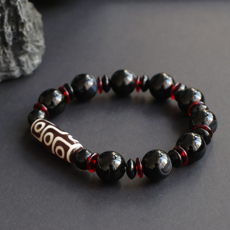 Bransoletka z Buddha Stones z czarnego onyksu i dziewięcioocznych koralików Dzi, chroniąca bogactwo