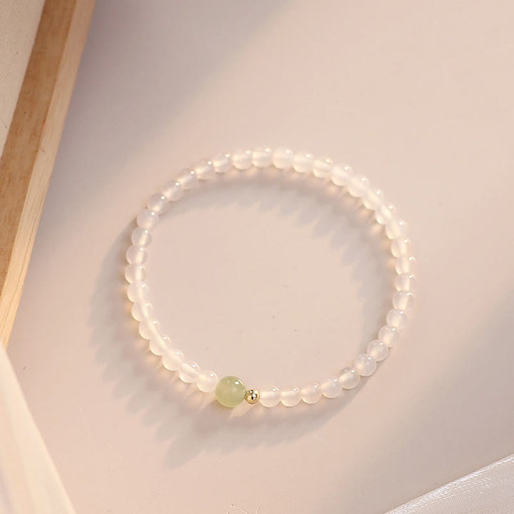 Bransoletka ochronna z naturalnego białego agatu i jadeitu z Buddha Stones