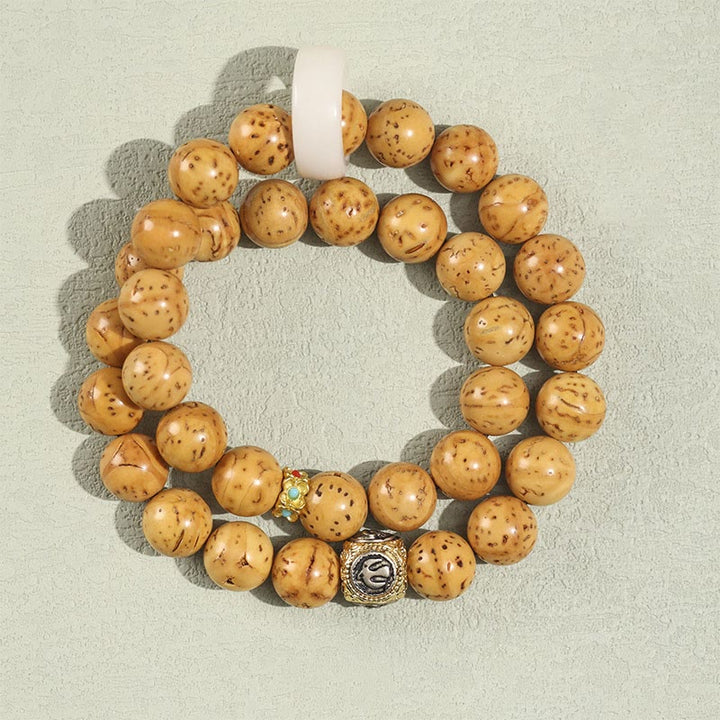 Buddha Stones Tybetańskie Naturalne Fioletowe Złoto Szczur Bodhi Nasiona Bogactwa Bransoletka Podwójnie Owijana