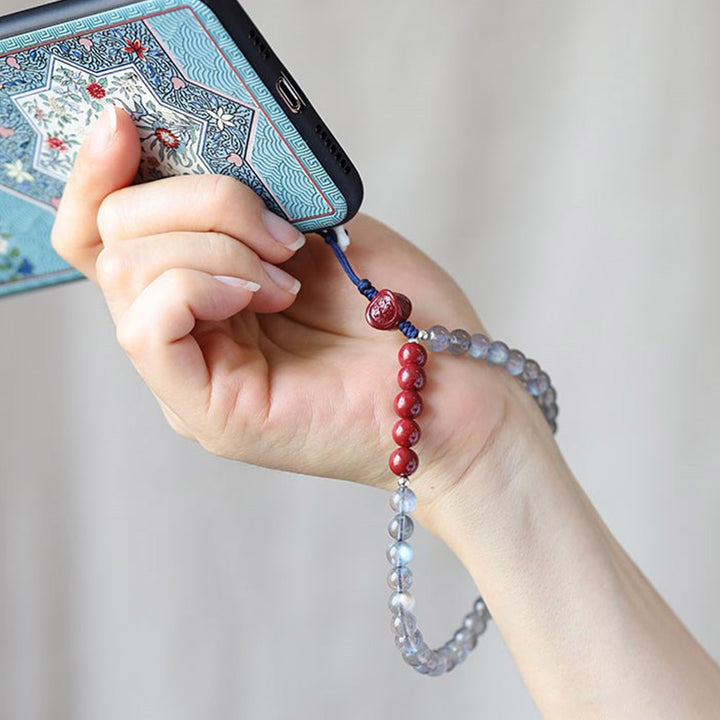 Naturalny kamień księżycowy cynober spokojna pozytywna dekoracja telefonu