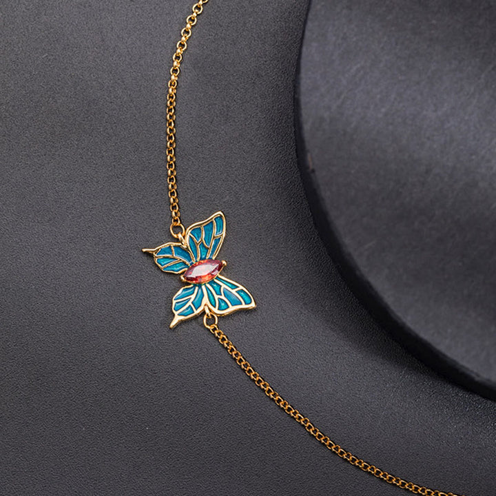 Bransoletka z łańcuszkiem motylkowym i cyrkoniami w kolorze srebra próby 925 z Buddha Stones