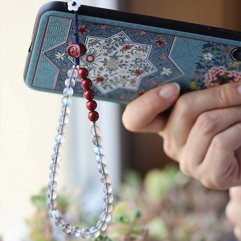 Naturalny kamień księżycowy cynober spokojna pozytywna dekoracja telefonu