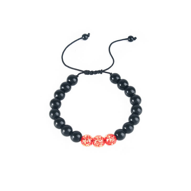 Bransoletka Buddha Stones Black Obsidian Luminous Glowstone Strength