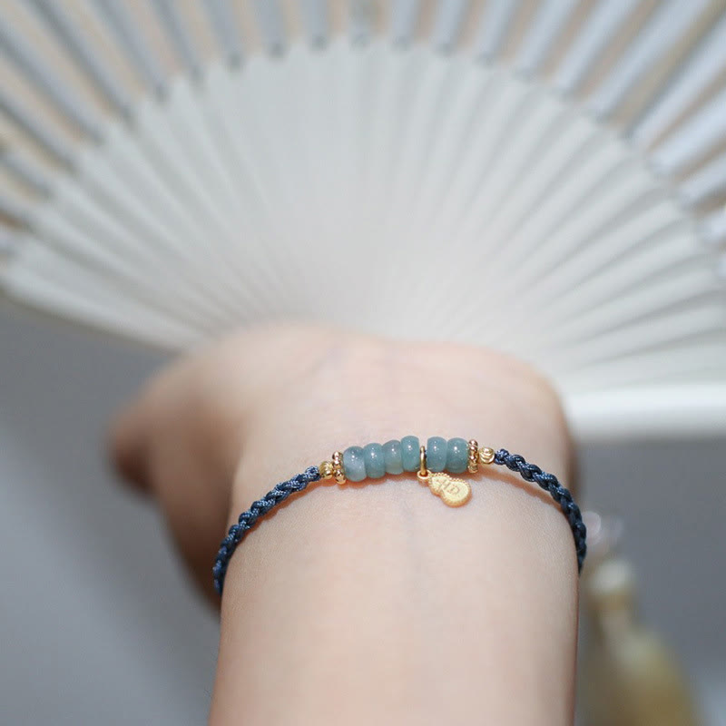 Bransoletka warkoczowa z naturalnego jadeitu i kwarcu rutylowego Fu Character Luck wykonana ze srebra próby 925