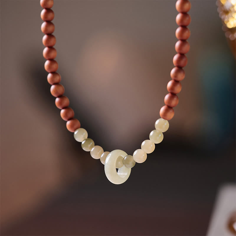 Bransoletka ochronna z podwójnym owinięciem z Buddha Stones sandałowym Hetian Jade