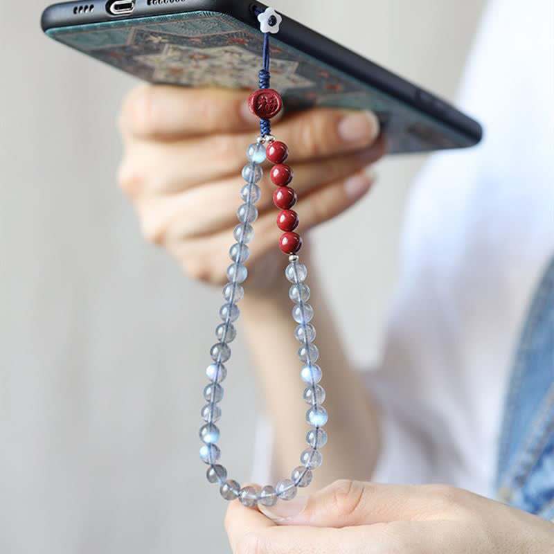 Naturalny kamień księżycowy cynober spokojna pozytywna dekoracja telefonu