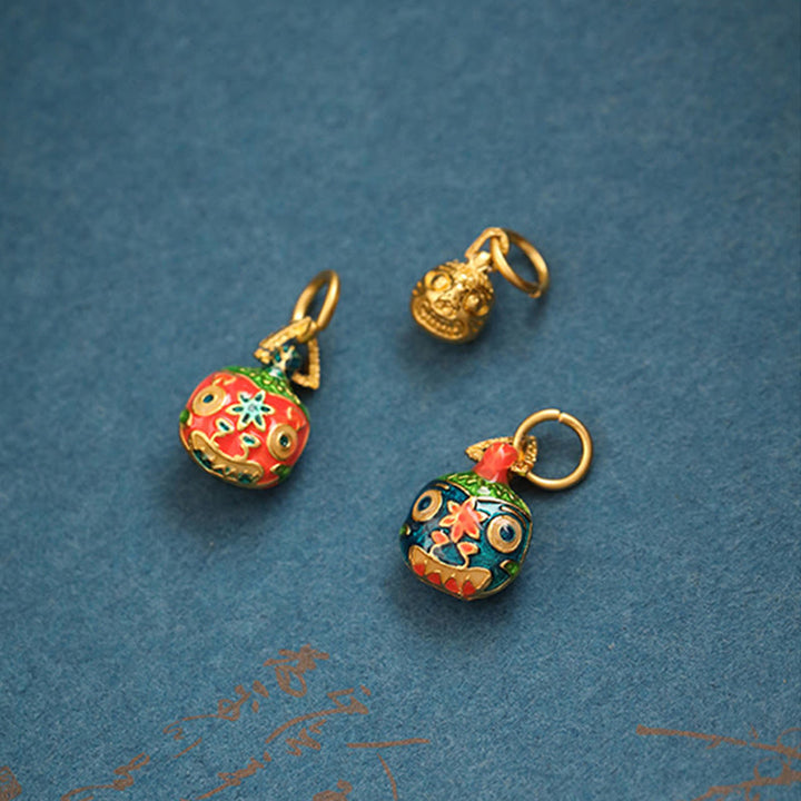 Złoty breloczek do kluczy z motywem rodzinnego szczęścia bestii połykającej złoto