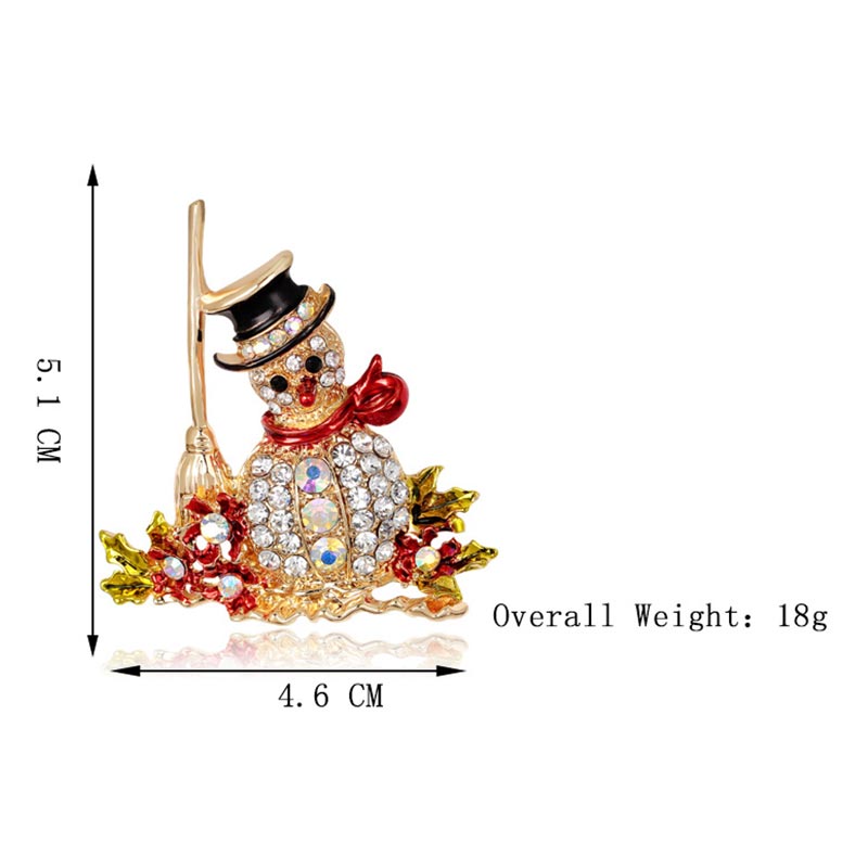 Broszka z kryształkami i wielokolorowymi cyrkoniami na Boże Narodzenie